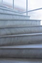 Geometrical pattern background of light gray stone marble stairs