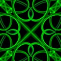 Geometrical pattern made of glowing neon green curved garlic plants