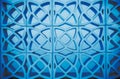 Geometrical symmetrical abstract ornament round fractal pattern background toned in trendy blue color. Modern minimalist