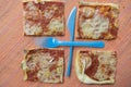 Geometries with pieces pizza and cutlery Royalty Free Stock Photo