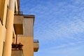 Geometry of building. Old concrete wall at sky background. Abstract architecture. Royalty Free Stock Photo