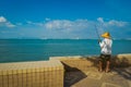 George Town, Malaysia - March 10, 2017: Beautiful scenic view of locals fishing in the esplanade in George Town, second