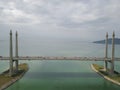 Aerial view traffic at Penang Bridge in cloudy morning.