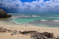 Georgeous beach with green water and dramatice sky on Rottnest island in Western Australia Royalty Free Stock Photo