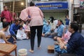 A performance group playing teacher and students at school.