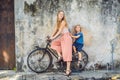 Georgetown, Penang, Malaysia - April 20, 2018: Mother and son on a bicycle. Public street art Name Children on a bicycle painted 3 Royalty Free Stock Photo