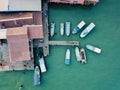 Aerial view boats anchor at wooden house at sea.