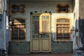 Vintage door and windows with grills of a traditional house in the heritage town of Royalty Free Stock Photo