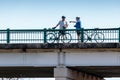 Couple Riding Bicycles on the San Gabriel Bridge