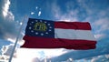 Georgia flag on a flagpole waving in the wind in the sky. State of Georgia in The United States of America. 3d rendering Royalty Free Stock Photo