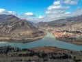 Georgia, Mtskheta: river confluence and mountains top view. Confluence of Aragvi and Kura rivers. Beautiful georgian landscape.