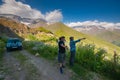 Georgia, Racha - August 13, 2015: A group of travelers enjoys the amazing view of the mountains Royalty Free Stock Photo