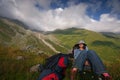 Georgia, Racha - August 17, 2013: The traveling girl rests against the backdrop of an amazing view