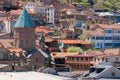 Georgia, Tbilisi - April 15, 2021: Houses with balconies in the historic district of Tbilisi. Georgia. Evening View. Beautiful Old