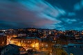 Georgia, Tbilisi - 05.02.2019. - Night cityscape view. Thick clouds moving over the sky- Image