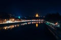 Georgia, Tbilisi - 05.02.2019. - View over Mtkvari river. Holy trinity Sameba church glowing in the night