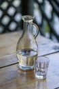 Georgian chacha in a decanter on the table, close up