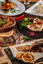 Georgian cuisine. A large laid table of different dishes for the whole family on a day off. Kebab, Lula, Lavash, Suluguni cheese Royalty Free Stock Photo