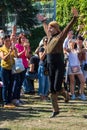 A Georgian man from a group of ethnic dancers from the country of Georgia perform in the open air.