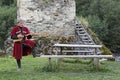 Georgian man plays local musical instrument of panduri and sings traditional svanetian songs in Ushguli, Caucasus Mountains, Georg