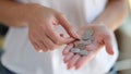 Georgian one lari coins in woman hand closeup Royalty Free Stock Photo