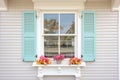 georgian style window with shutters and dentil trim above Royalty Free Stock Photo