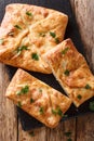 Georgian traditional Khachapuri stuffed with Suluguni cheese, eggs close-up. Vertical top view Royalty Free Stock Photo