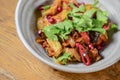 Georgian vegetable and meat salad with onion, basil, tomato, parsley and pepper Royalty Free Stock Photo