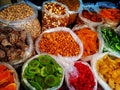 Georgian wide range of colourful traditional food on sale in small street market shop - closeup on nuts and colourful dried fruit Royalty Free Stock Photo