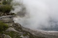 Geothermal Hot Spring with steam rising Royalty Free Stock Photo