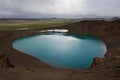 Geothermal lake inside of the Viti crater and hills behind, Krafla, Iceland Royalty Free Stock Photo