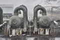 Geothermal power plant in falling snow storm