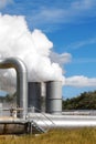 Geothermal power plant pipes and mist Royalty Free Stock Photo