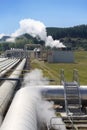 Geothermal power plant pipes perspective Royalty Free Stock Photo