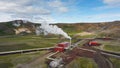 Geothermal power station in Icelandic landscape, steaming chimneys in a valley Royalty Free Stock Photo