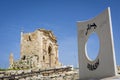 entrance of the historical roman ruins site of Gerasa in Jerash, Jordan, with the Arch of Hadrian in the background