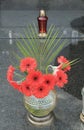 Gerbera flowers on the grave