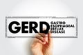 GERD - Gastroesophageal Reflux Disease acronym text stamp, medical concept background