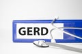 gerd word on file folder and stethoscope on white background