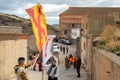 GERGAL, SPAIN - 21 JANUARY 2023 People taking part in the Moorish-Christian festival fighting for the image of Saint San Sebastian