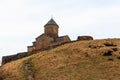 Gergeti Trinity Church Tsminda Sameba, Holy Trinity Church near the village of Gergeti in Caucasian mountains, Georgia Royalty Free Stock Photo