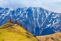 Gergeti Trinity Church Tsminda Sameba, Holy Trinity Church near the village of Gergeti in Caucasian mountains, Georgia Royalty Free Stock Photo