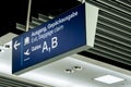 German airport dusseldorf exit and baggage claim blue sign gates A and B Royalty Free Stock Photo