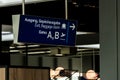 German airport dusseldorf exit and baggage claim blue sign gates A and B Royalty Free Stock Photo