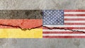 German and American flag on a cracked background-politics, war concept Royalty Free Stock Photo