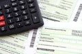 German annual income tax return declaration and calculator lies on accountant table close up. The concept of taxpaying period in