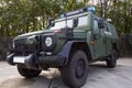 German armored military police vehicle stands on platform