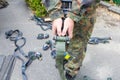 Army soldier holds a lashing ratchet