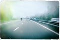 German autobahn car and motorcyclist vintaage film frame Royalty Free Stock Photo