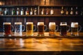 german beer steins lined up on a wooden table